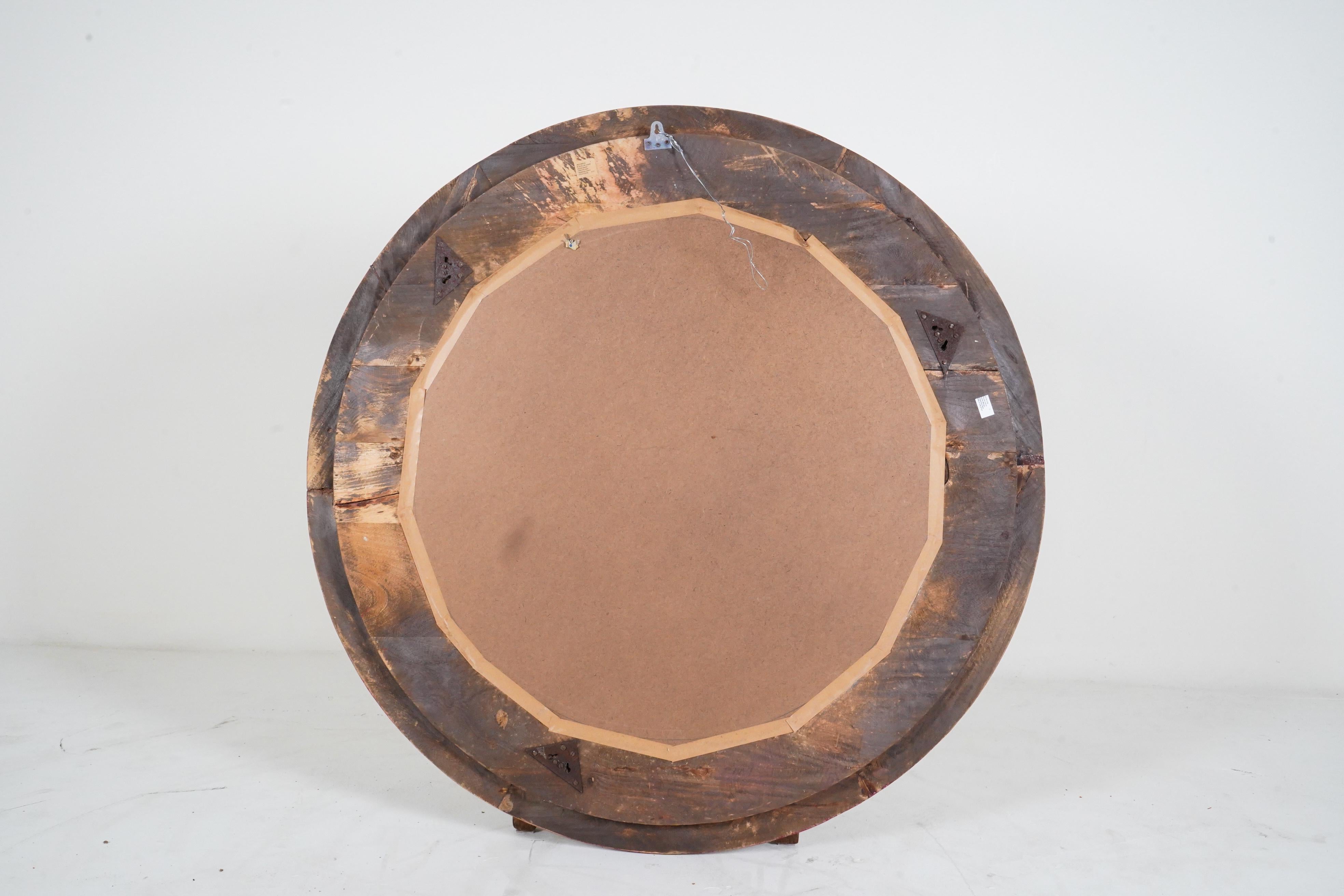Contemporary A Carved Mango Wood Round Mirror Frame For Sale