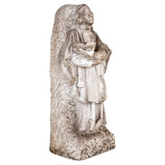 A Carved Marble Statue of a Saint by Artist K.M.Demuynck