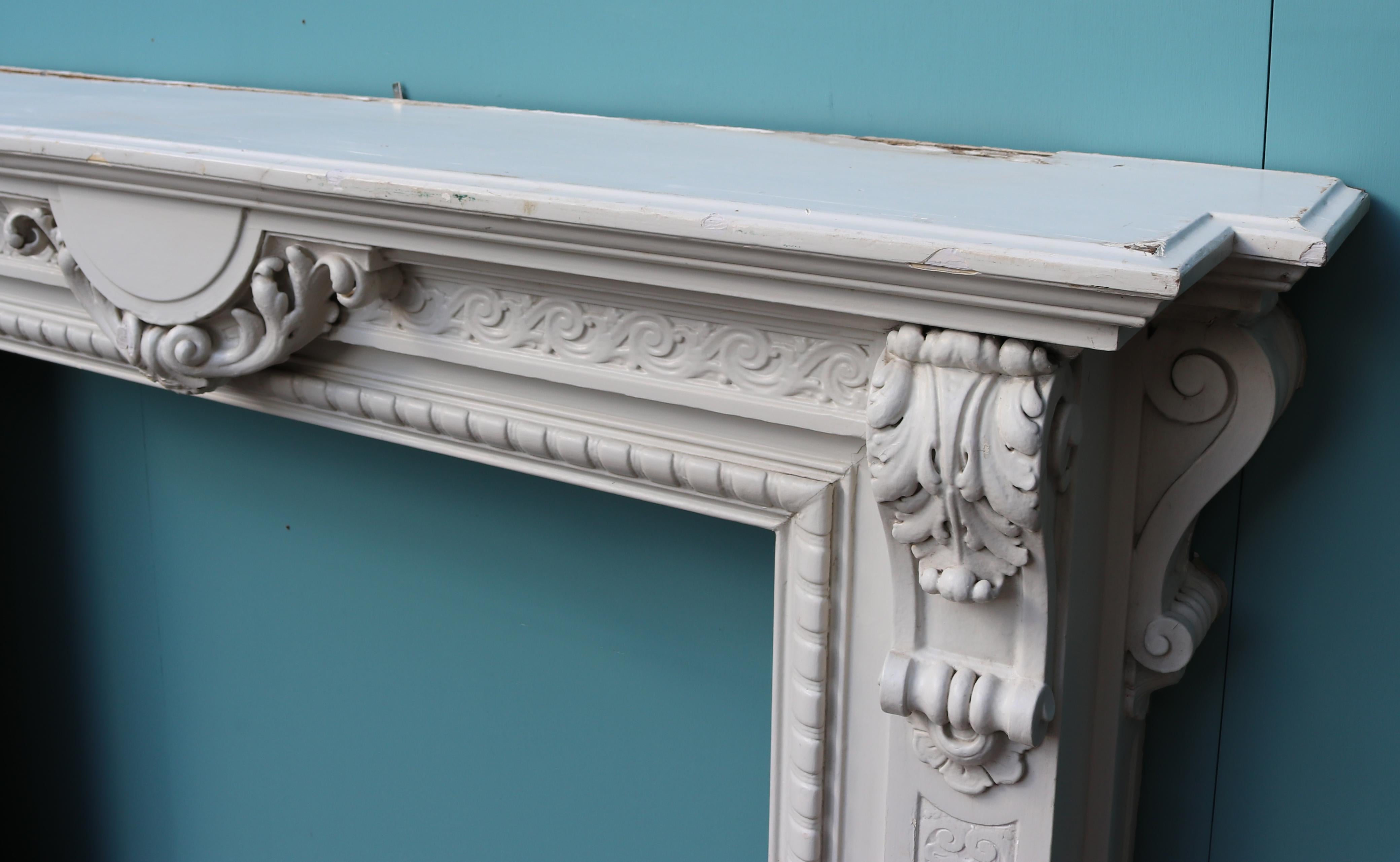 French Carved Oak Antique Fire Mantel by GUERET FRERES For Sale