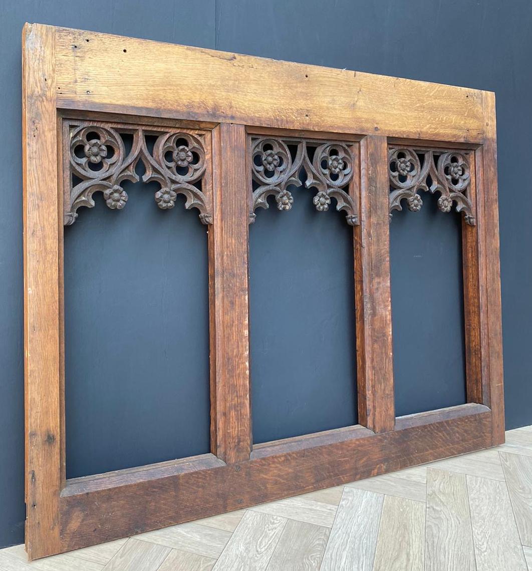 An English Gothic tracery panel, suitable for conversion to a mirror or bed head, etc.