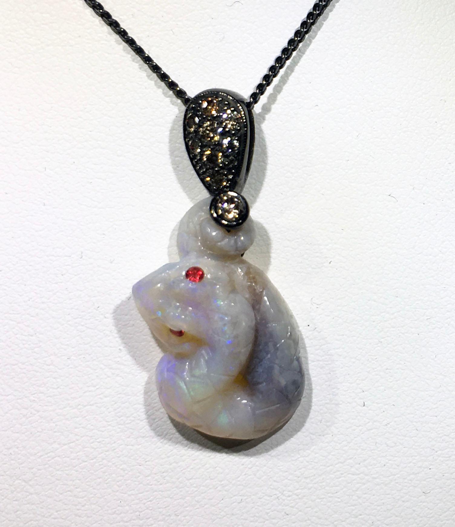 Opal Snake Pendant Set with Coniac Diamonds and Red Sapphires For Sale 3