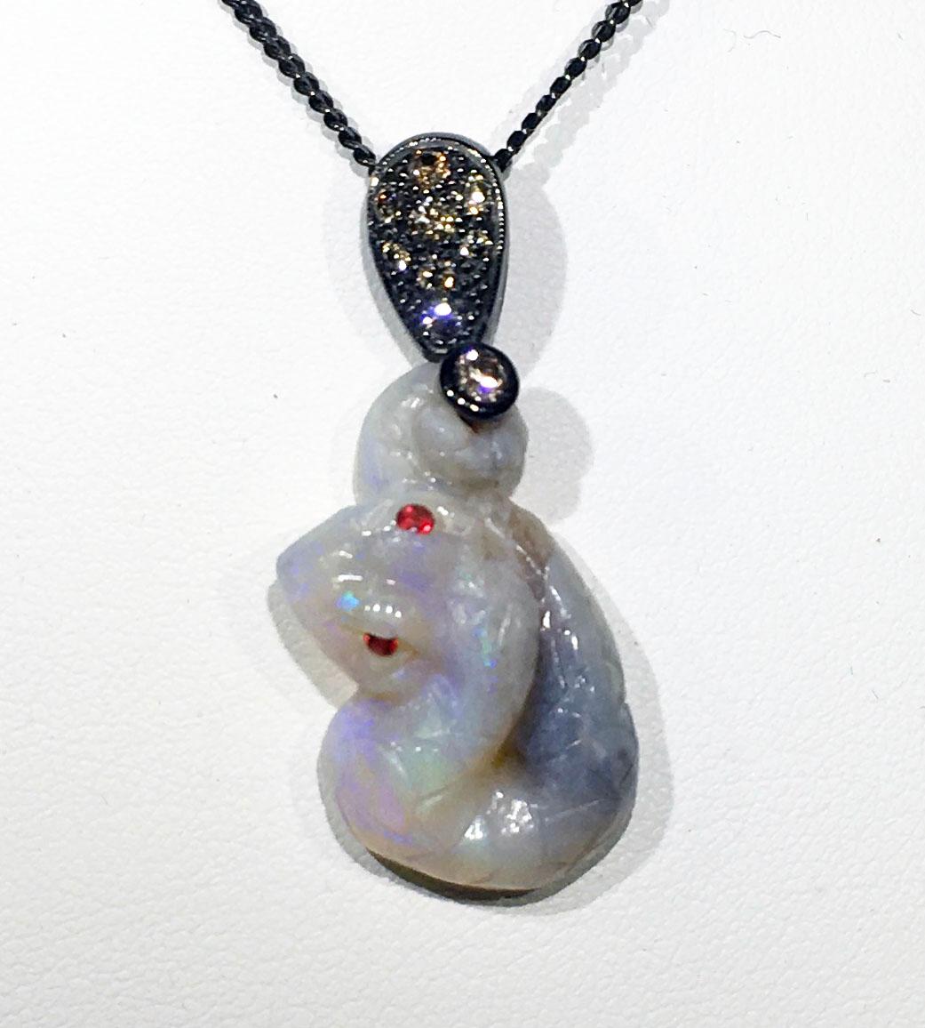 Opal Snake Pendant Set with Coniac Diamonds and Red Sapphires In New Condition For Sale In Coupeville, WA