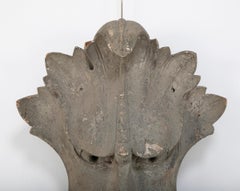 Carved and Painted Wood Architectural Element in the Form of a Mask "Green Man"