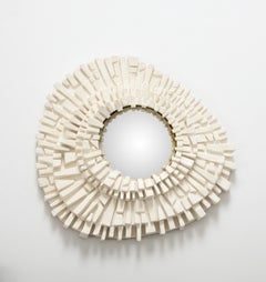 Miroir en plâtre sculpté