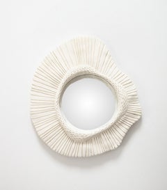 Une sculpture  Miroir en plâtre