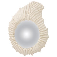 A Carved Plaster Mirror