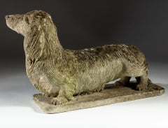 Carved Stone Long Haired Daschund Sculpture