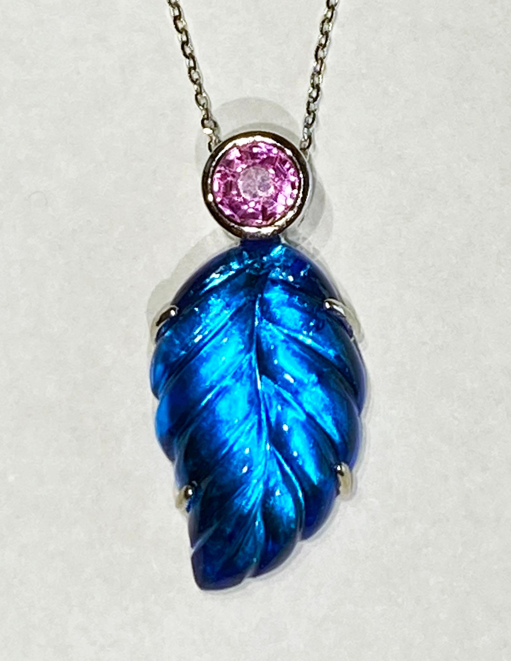 Modern Carved Topaz Leaf Pendant Accented with a Light Pink Sapphire For Sale