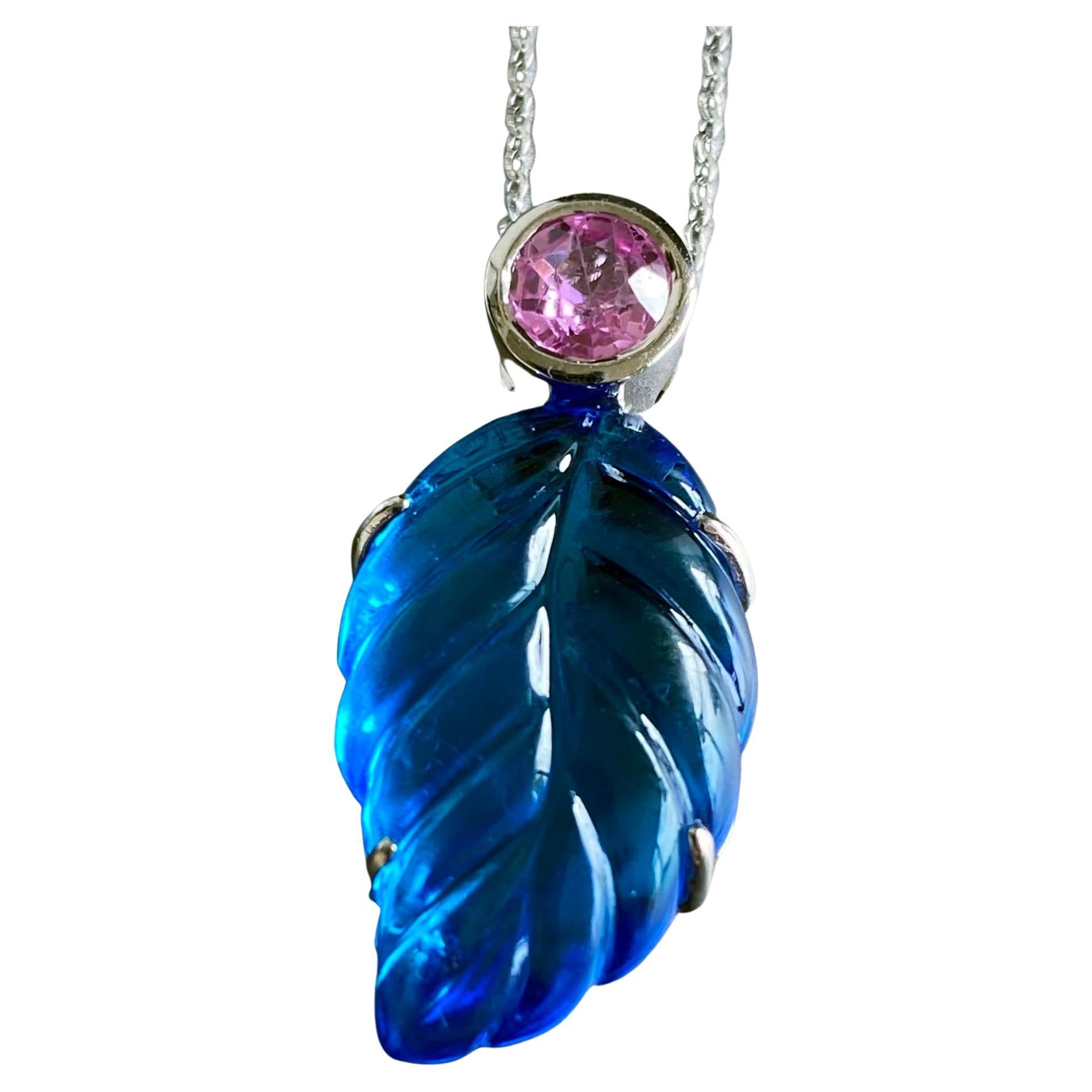 Carved Topaz Leaf Pendant Accented with a Light Pink Sapphire