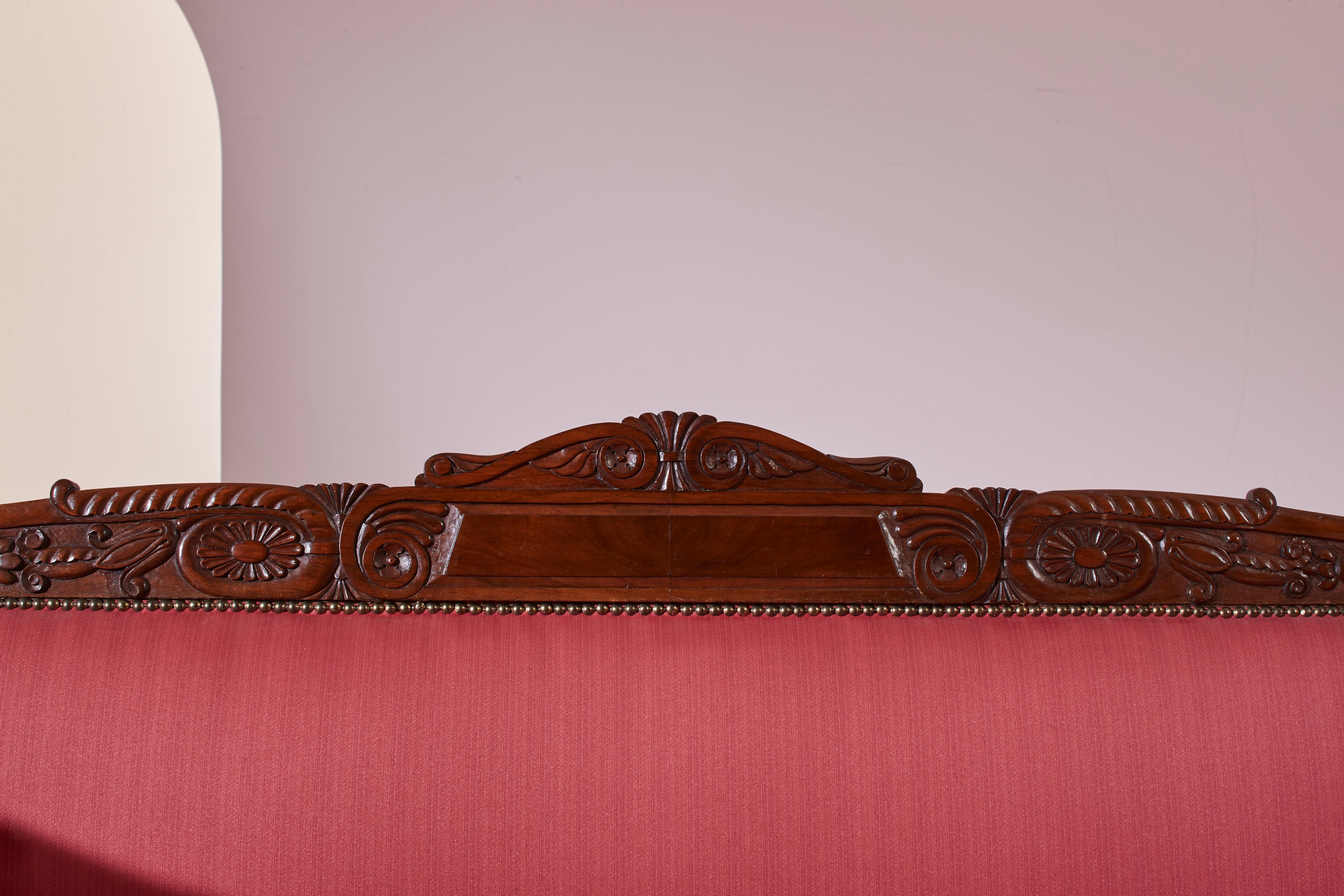 A carved walnut sofa with boat-shaped form in the style of Henry Thomas Peters For Sale 4