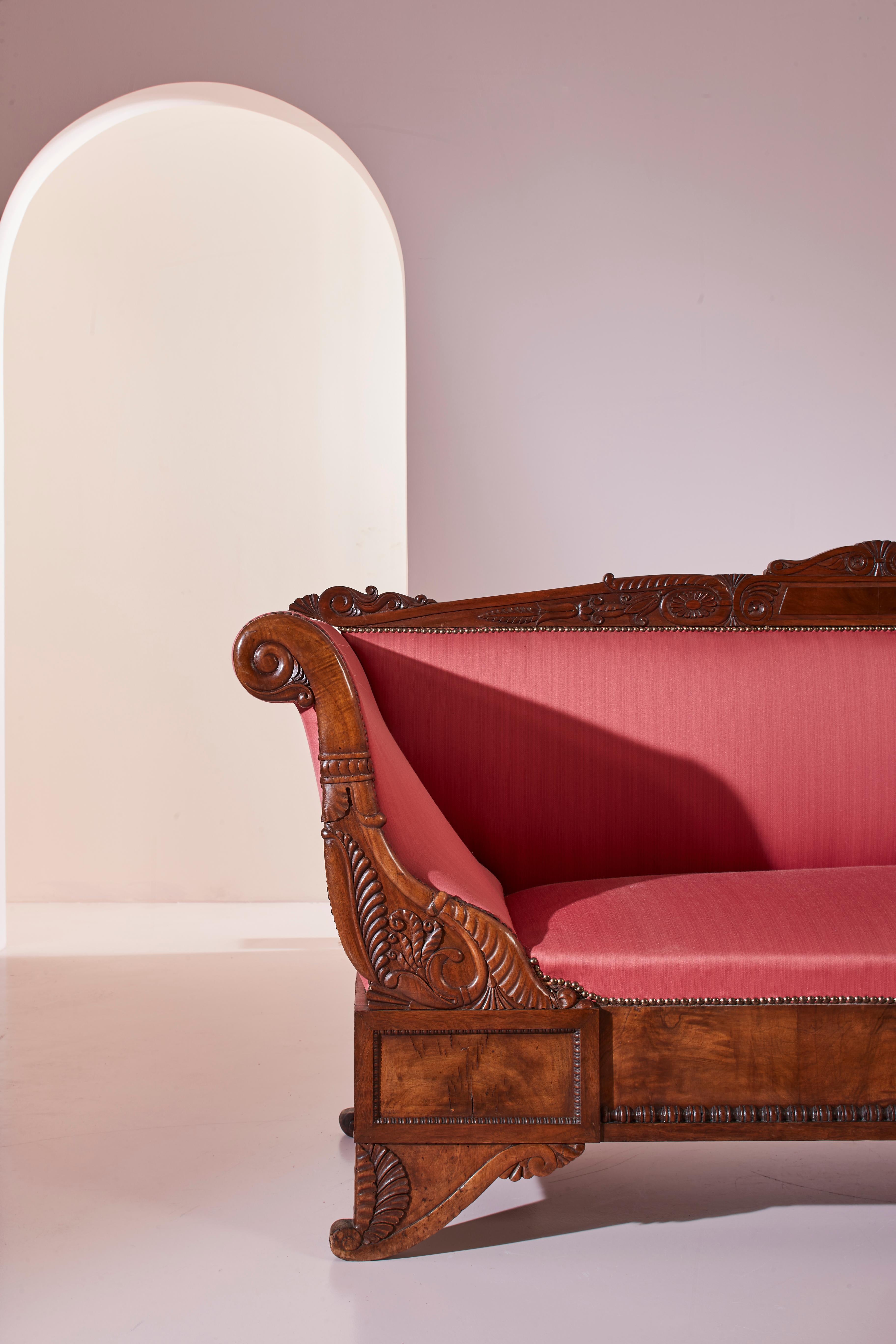 19th Century A carved walnut sofa with boat-shaped form in the style of Henry Thomas Peters For Sale