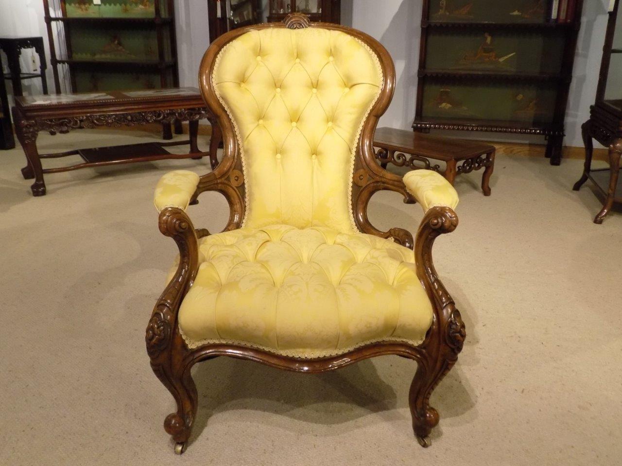 Mid-19th Century Carved Walnut Victorian Deep Buttoned Antique Armchair For Sale