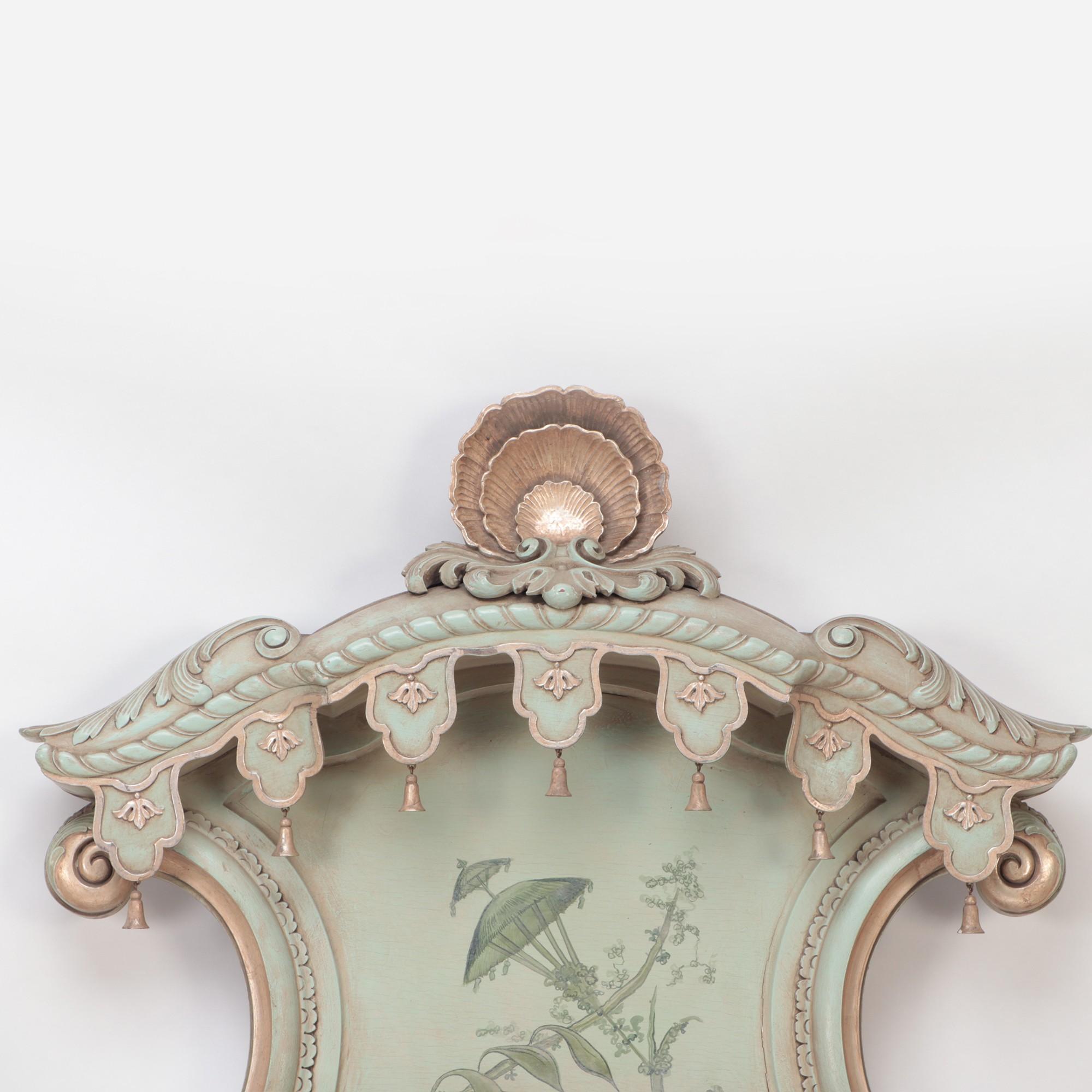 A beautiful Italian Venetian-style carved and antique green painted shaped headboard with floral leaf decoration. Circa 1950.