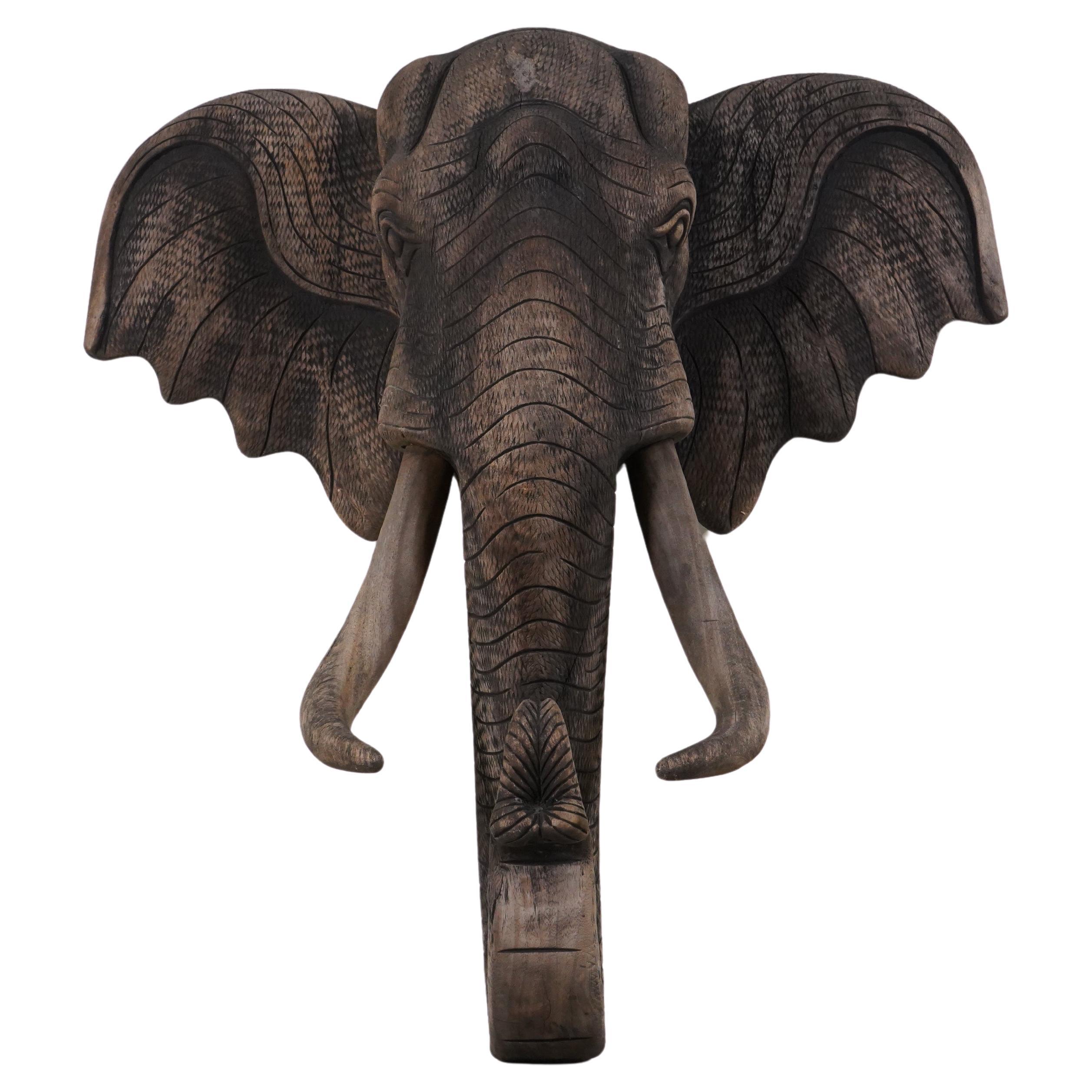 A Carved Wood Elephant Head For Sale