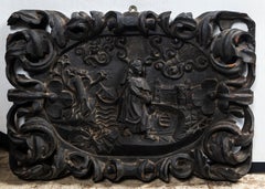 Carved Wood Panel of Religious Figure