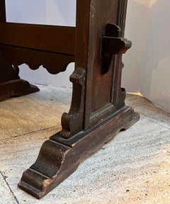 A carved wood side table