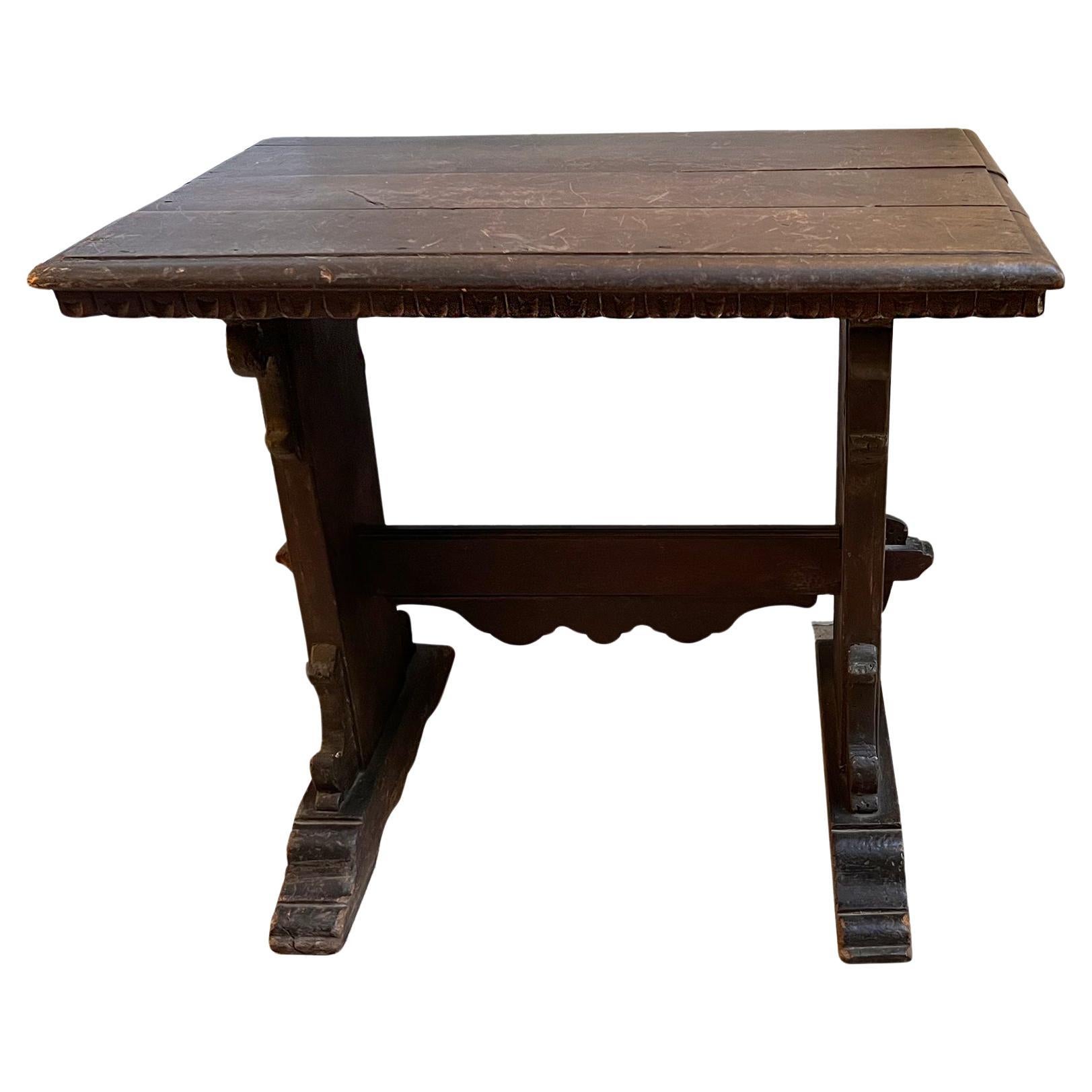A carved wood side table For Sale