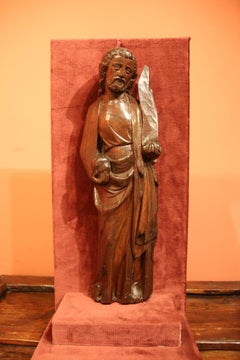 Carved Wooden Figure of a Saint Holding a Phylactery