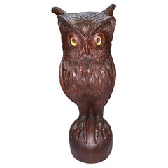 A Carved Wooden Owl Statue
