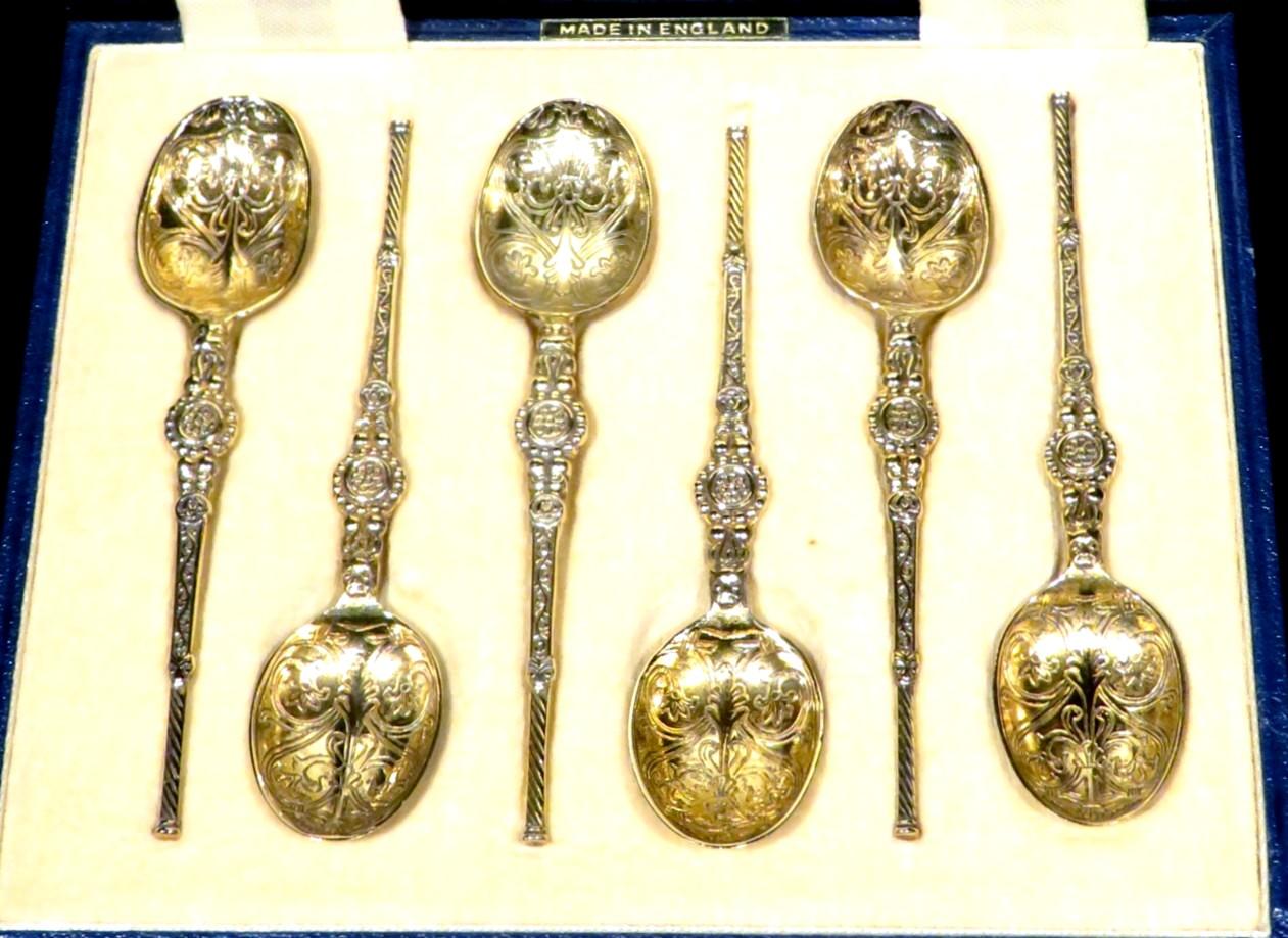 A fine set of six silver gilt coffee spoons fashioned in the form of anointing spoons made specifically to commemorate the Coronation of Queen Elizabeth II to the throne of England in 1952. Each is finely engraved and exhibits a rich gold wash, all