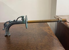 A Cast Bronze FW Spout with Small Florette and Egg and Dart Pattern