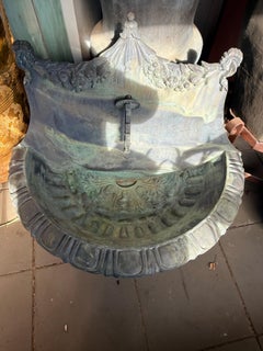 A Cast Bronze FW Wall Fountain