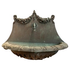 A Cast Bronze FW Wall Fountain