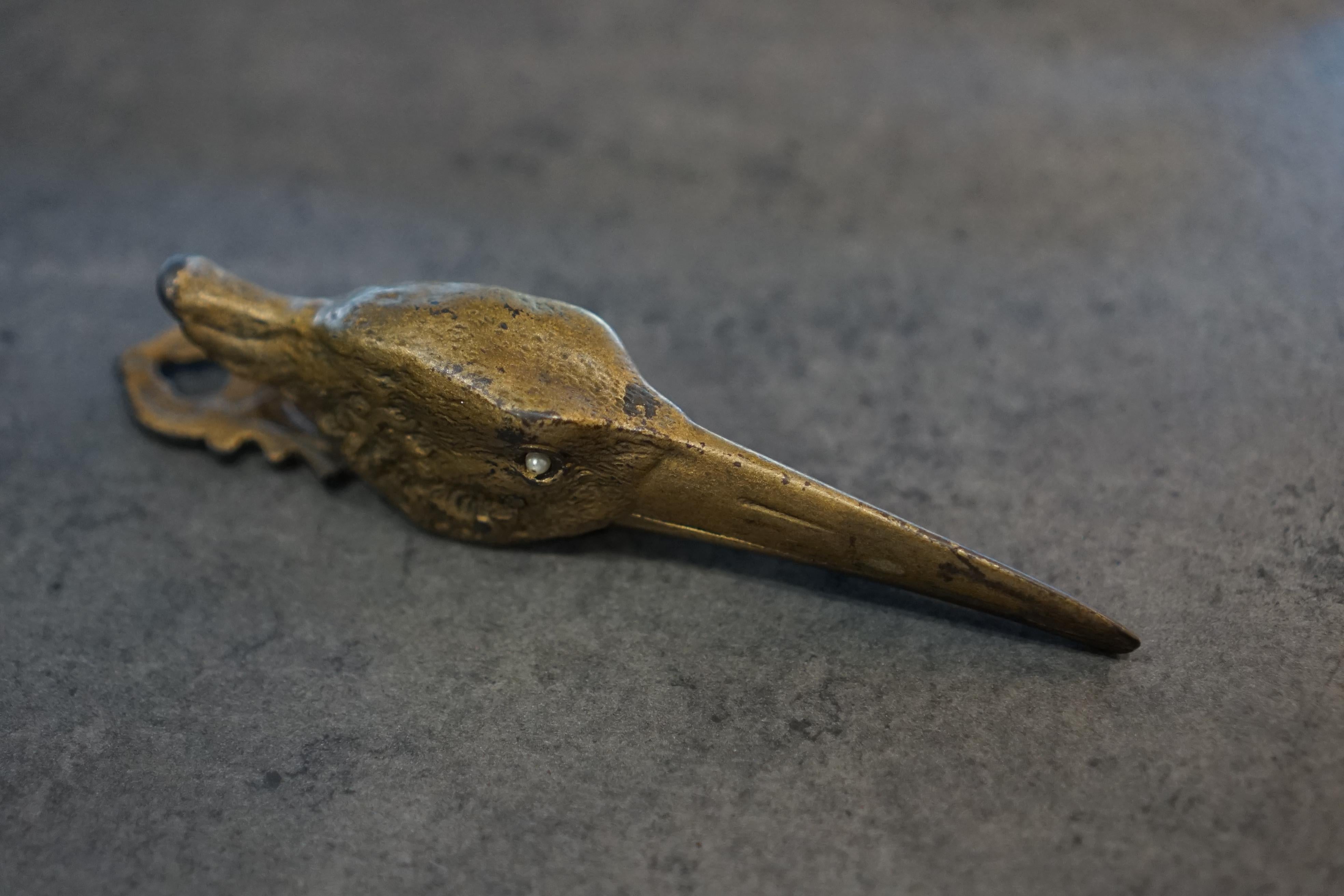 19th Century A cast bronze sprung hinged letter / document clip in the form of a crane’s head For Sale