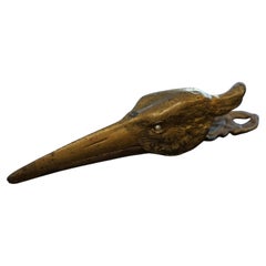 A cast bronze sprung hinged letter / document clip in the form of a crane’s head