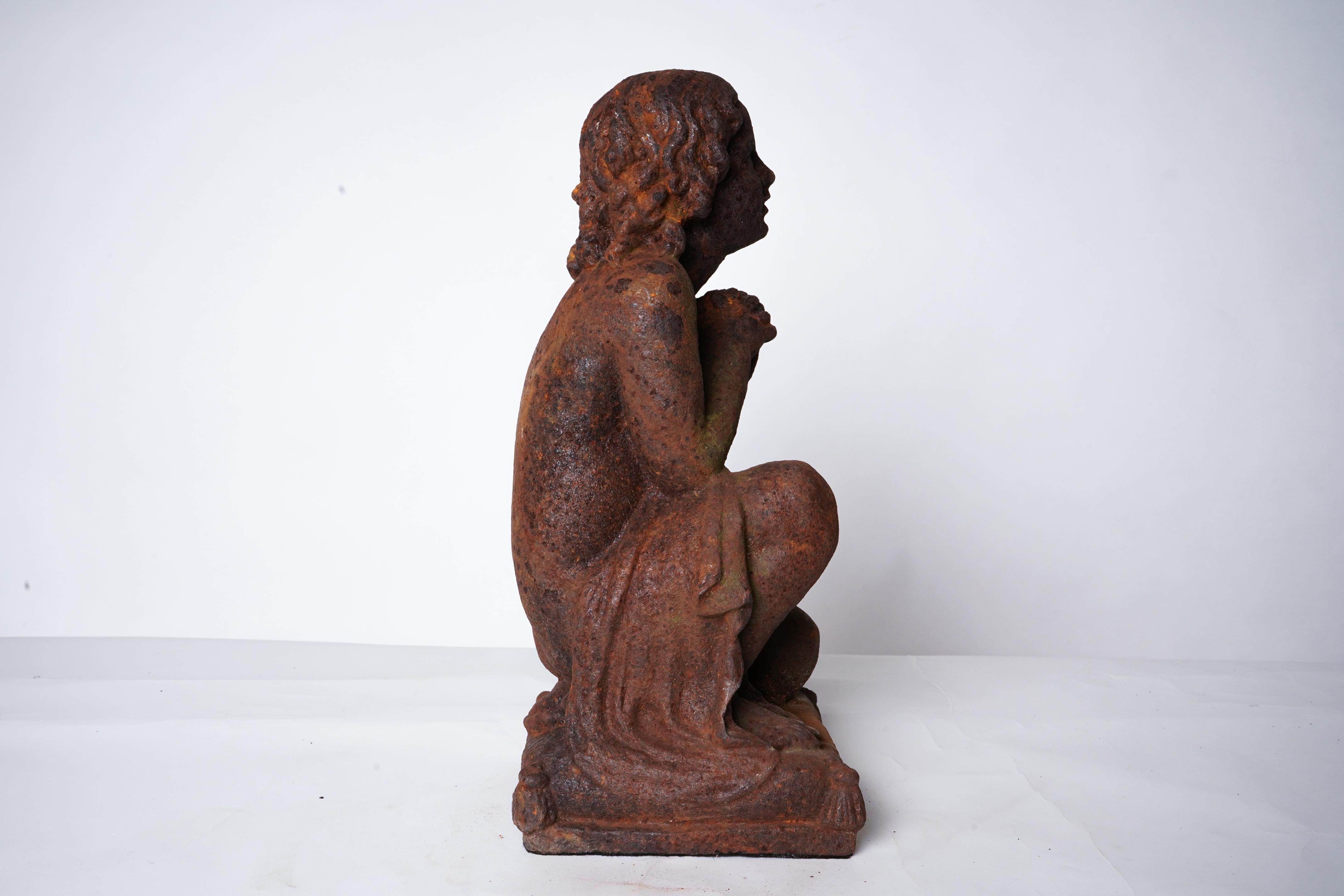 A Cast Iron Figure of a Young Boy For Sale 1