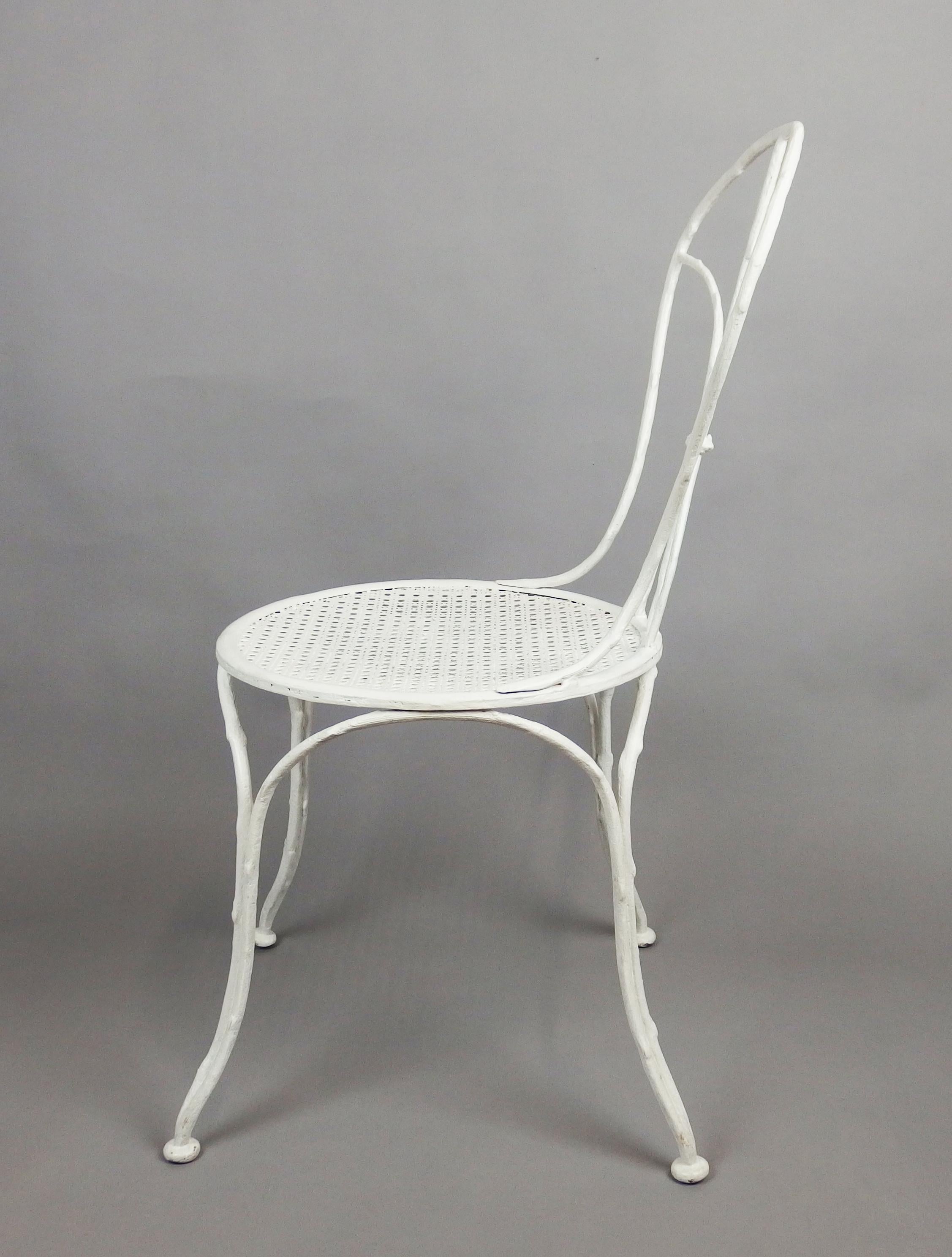 A branches shaped, white enameled cast iron chair, made by 