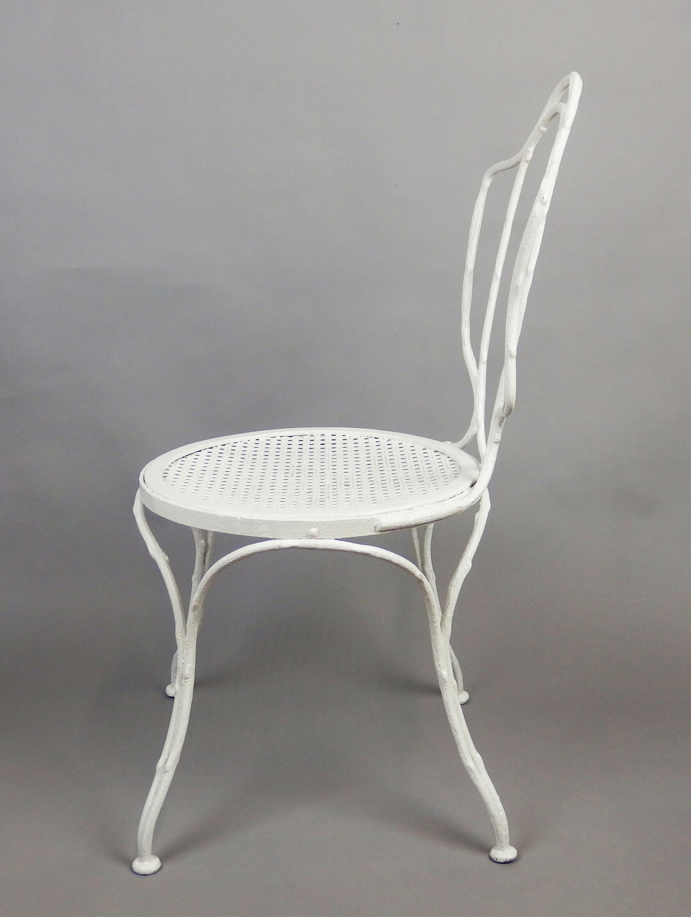 A tree branches shaped, white enameled garden chair manufactured by 