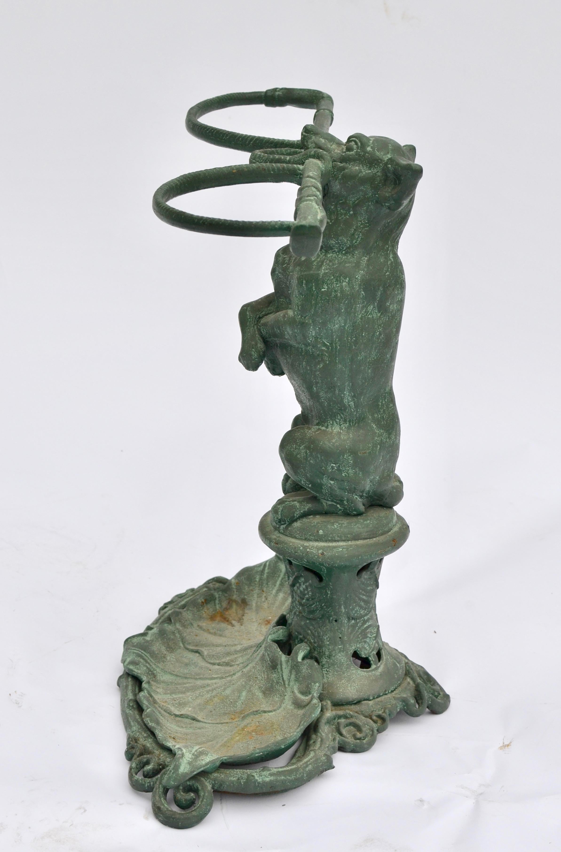 A figural cast iron umbrella stand of a dog holding the umbrellas. Probably Swedish and made by Bolinders foundry, second half of the 19th century.