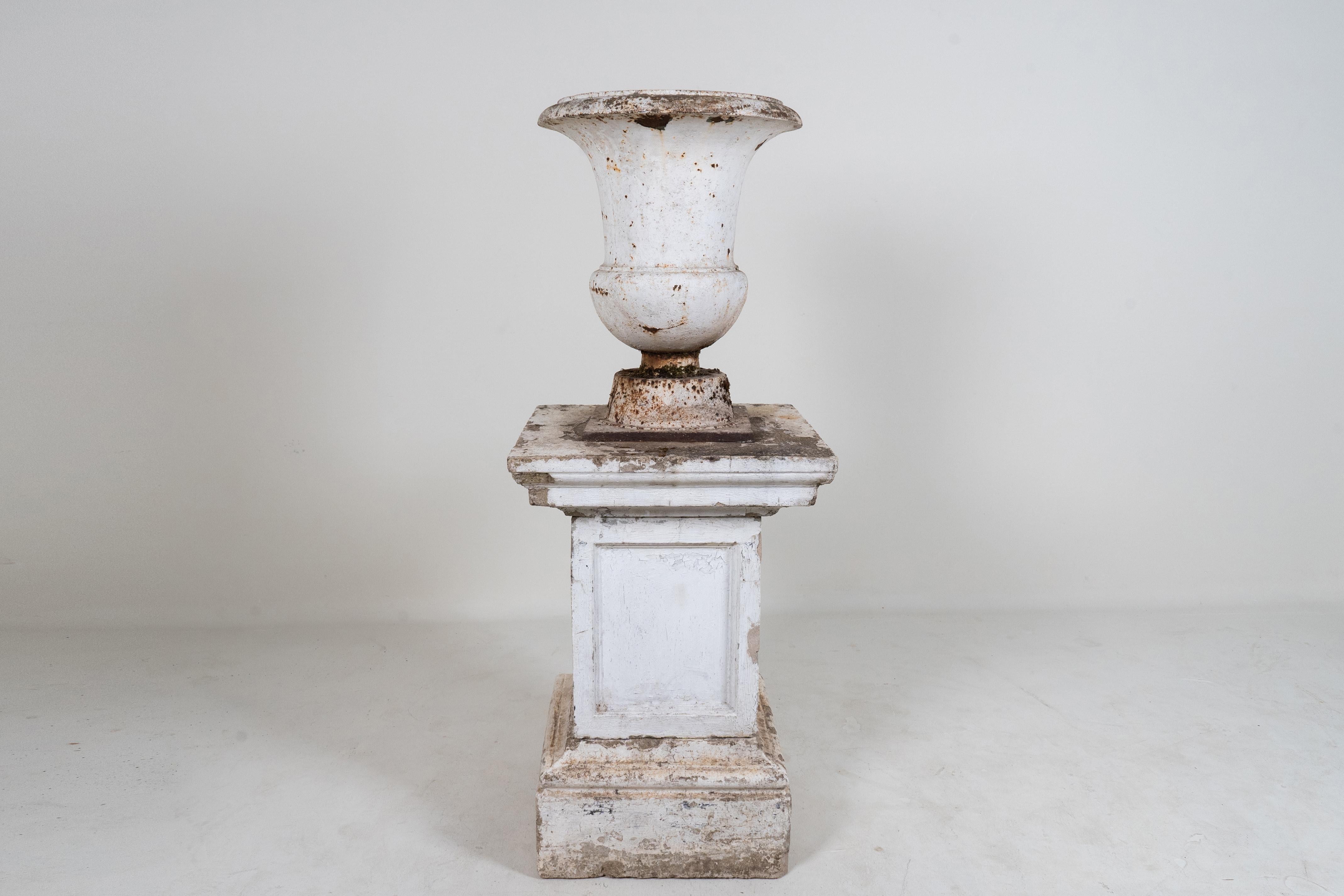 A Cast Iron Urn with a Cement Base, France 20th. C In Good Condition For Sale In Chicago, IL