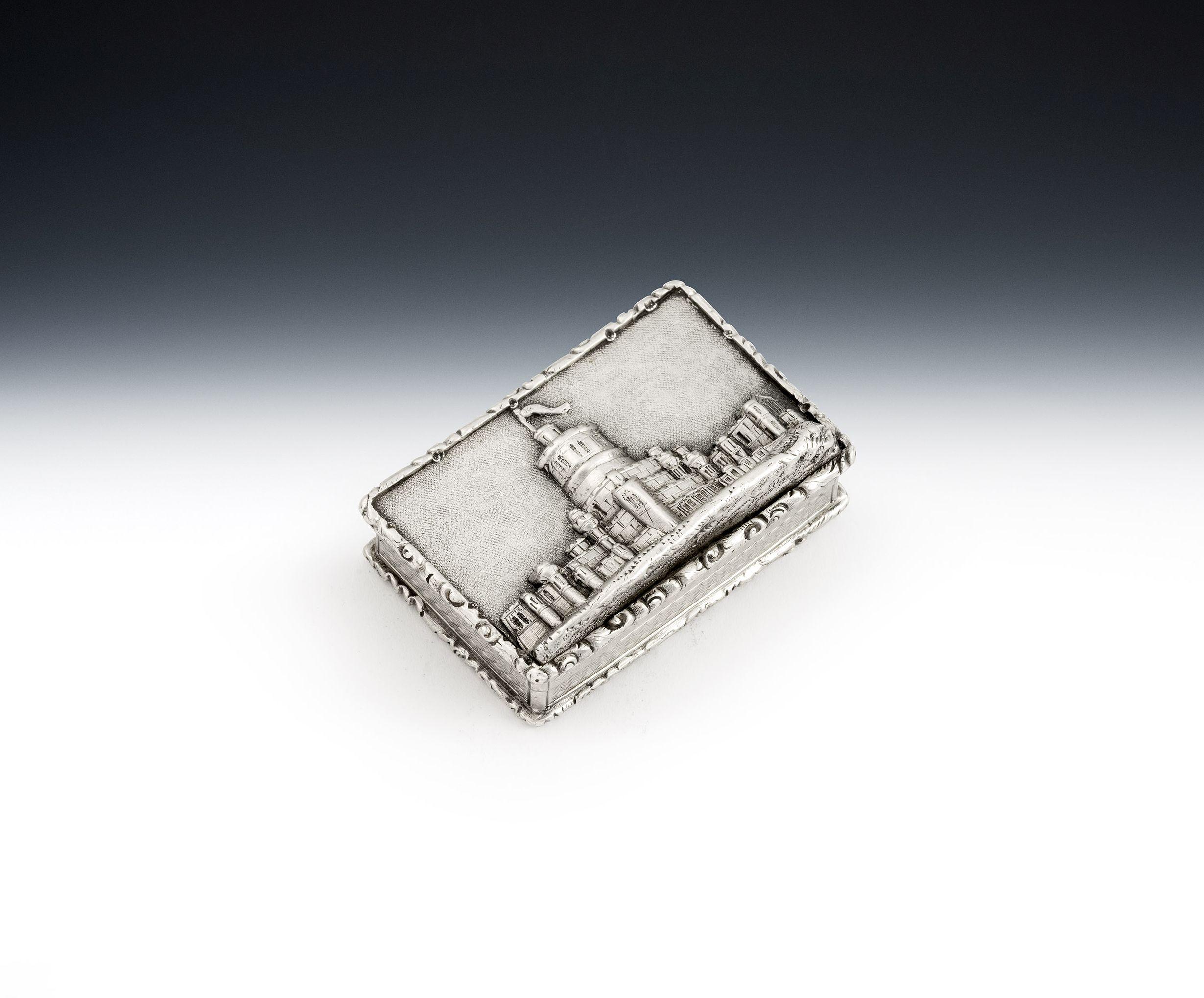 Windsor Castle. An extremely rare Castle Top Vinaigrette made in Birmingham in 1844 by John Tongue.

This very rare Vinaigrette is broad rectangular in form and both the sides and base are decorated with engine turned engraving, within raised