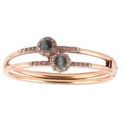 A Cat's Eye Chrysoberyl And Diamond Bangle Bracelet , circa 1880's