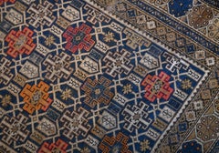 A Caucasian Shirvan in Shades of Camel, Coral, Blue and Orange c.1910