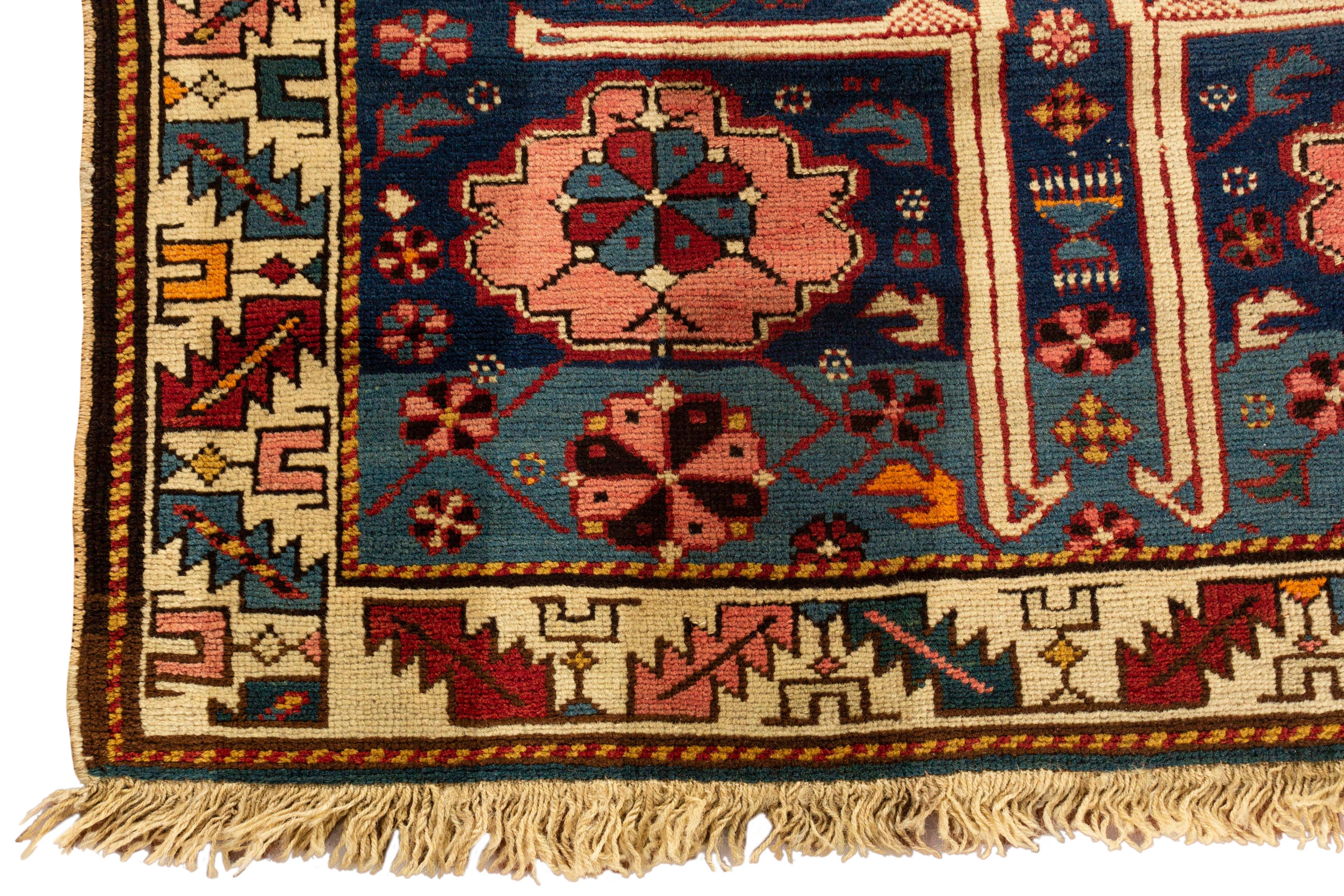 A Shirvan handwoven Caucasian rug circa 1920. These types of antique Caucasian rugs were woven in the eastern part of the region, mostly along the west coast of the Caspian Sea and show in the design, the ethnic style associated with Caucasian