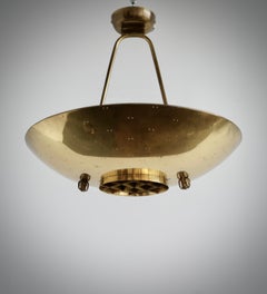 A ceiling lights by Paavo Tynell