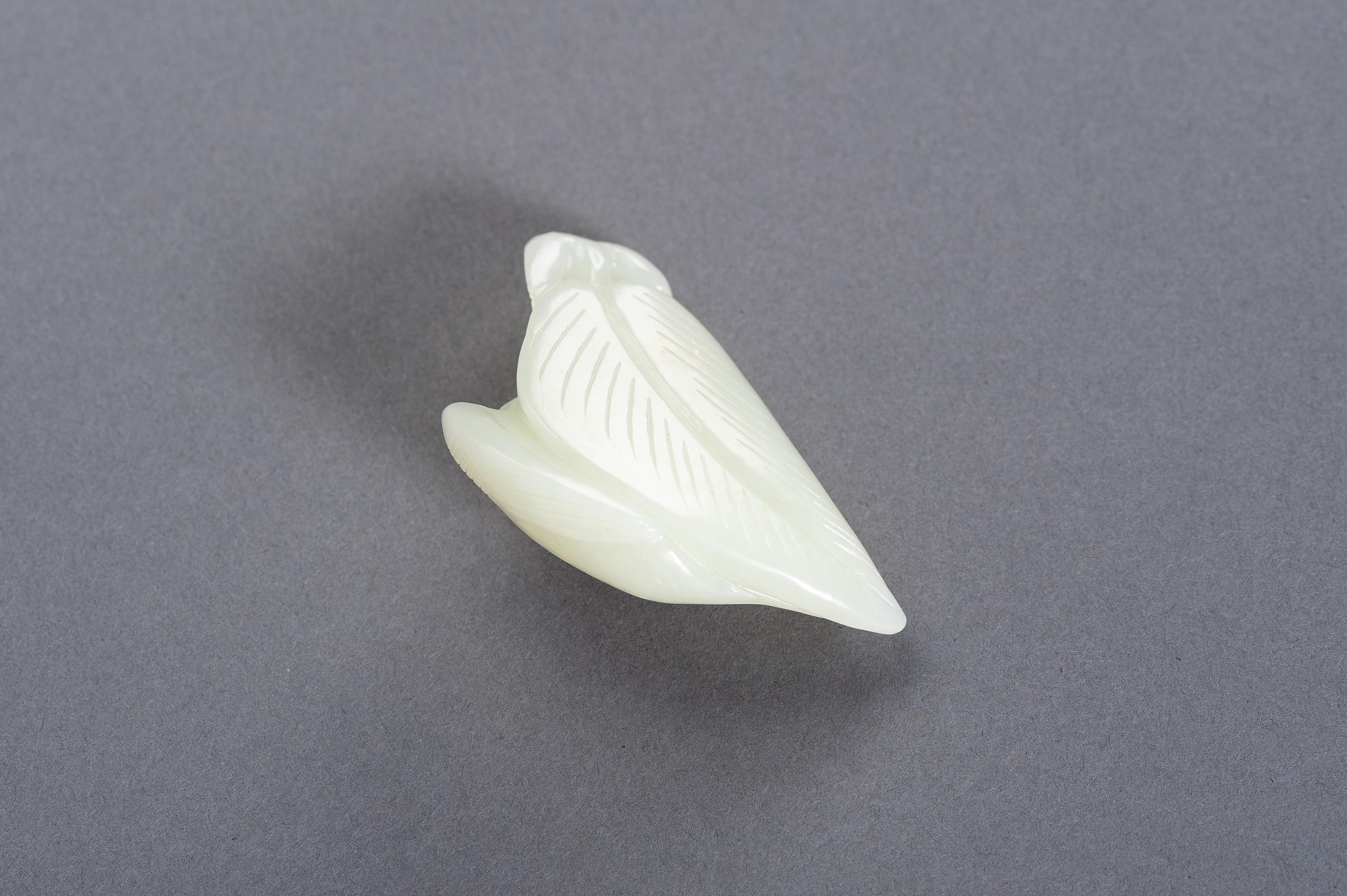 Chinese Celadon Jade 'Bird of Prey on Leaf' Pendant, China, Late Qing to Republic For Sale