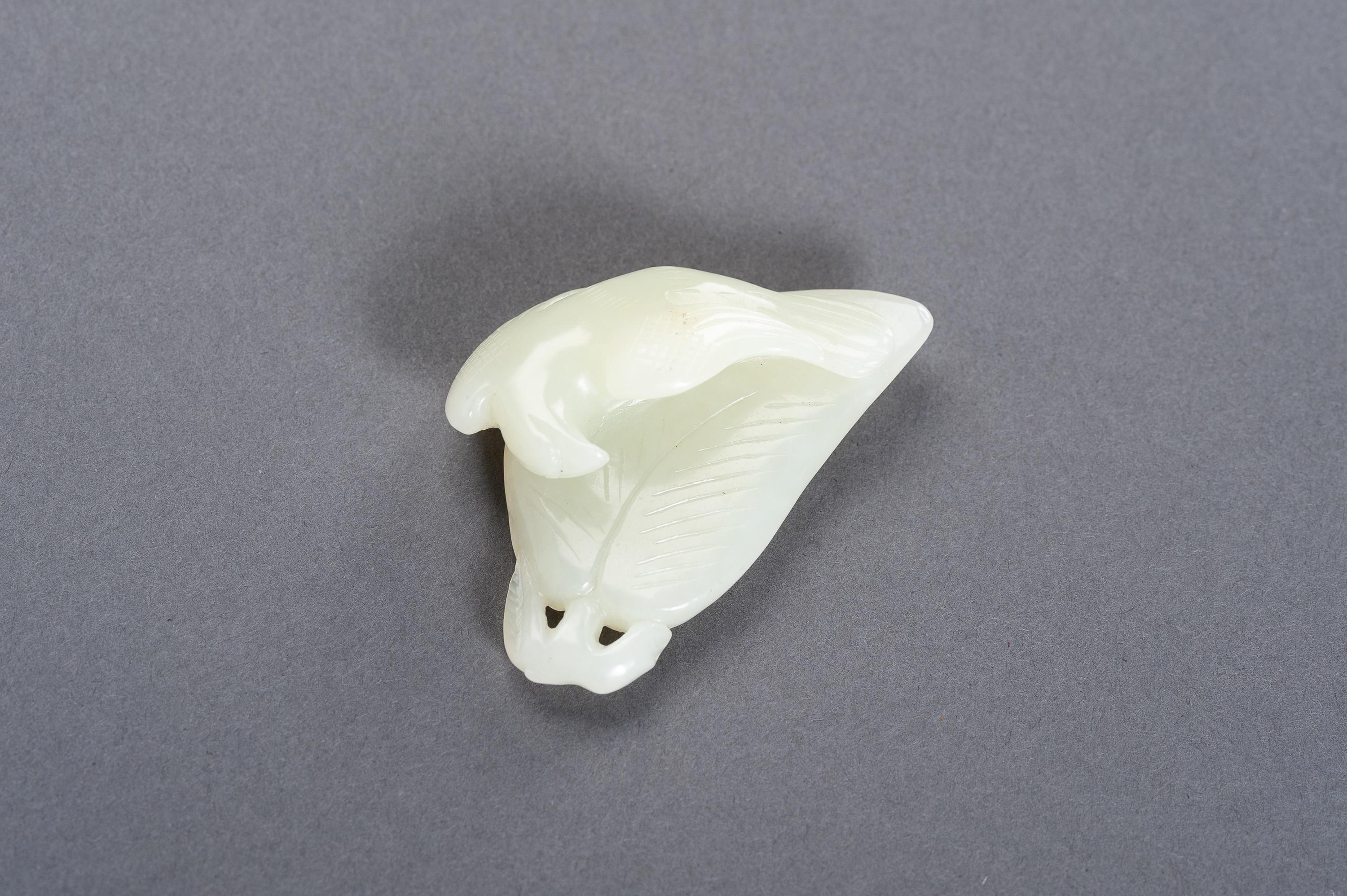 Celadon Jade 'Bird of Prey on Leaf' Pendant, China, Late Qing to Republic For Sale 1