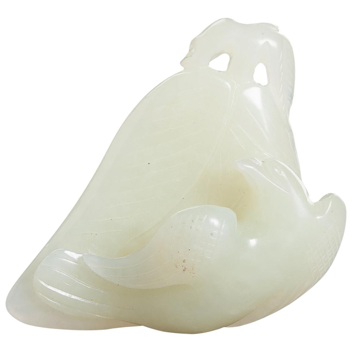 Celadon Jade 'Bird of Prey on Leaf' Pendant, China, Late Qing to Republic For Sale