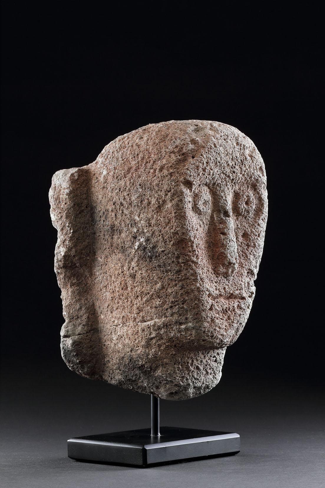 18th Century and Earlier A Celtic Stone Head with ‘Staring’ Eyes, Long Nose and Slit Mouth For Sale