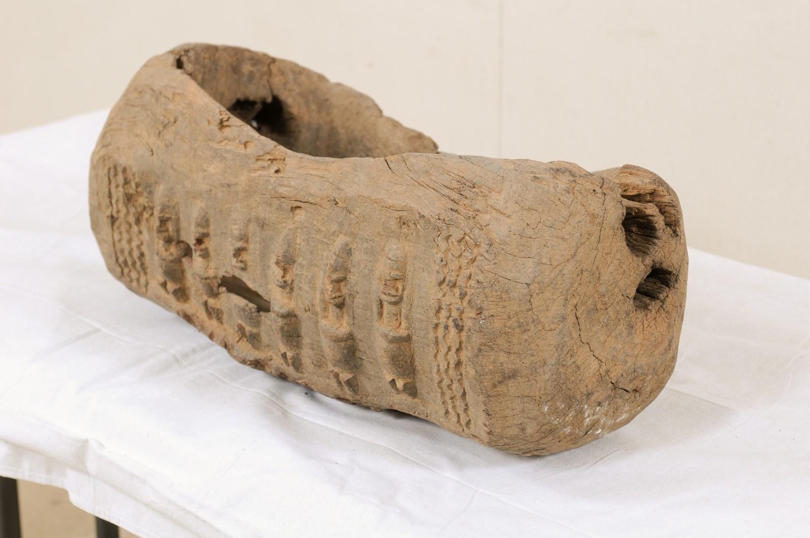 Hand-Carved Central African Wooden Vessel Adorn with Figures Carved Along Sides For Sale