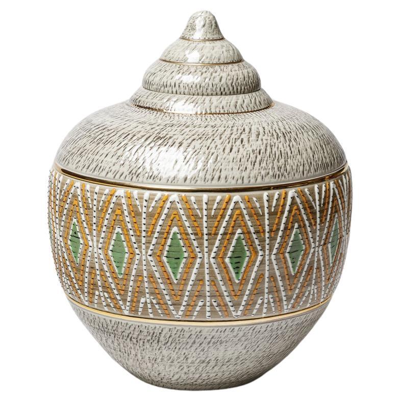 A ceramic covered jar by Jacques Breugnot , circa 1960-1970
