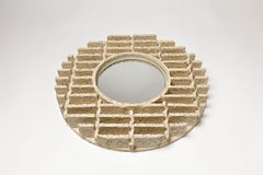 Uno specchio in ceramica di Denis Castaing, 2019