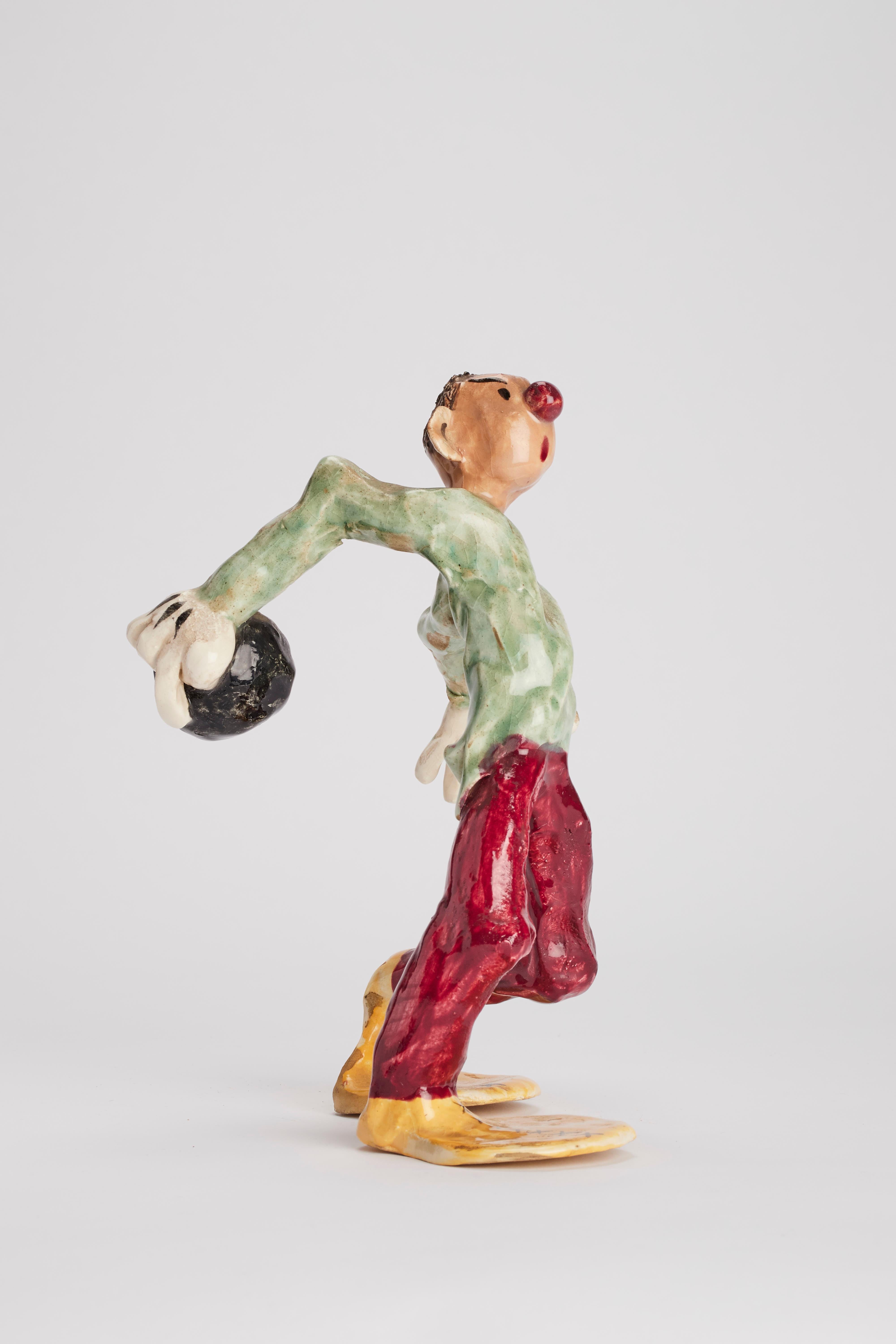 American Ceramic Sculpture, a Man Playing Bowls, Usa 1900.  For Sale