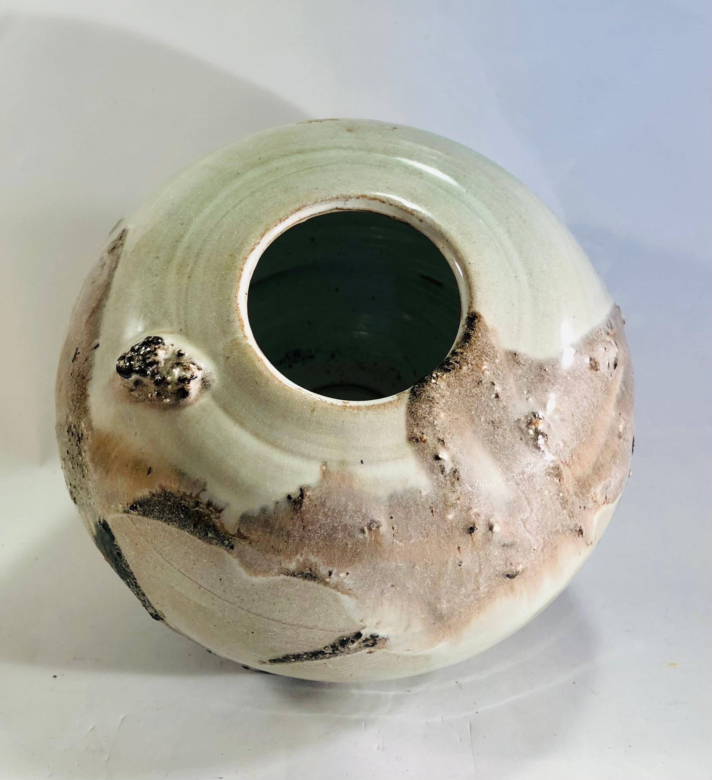 Turned A ceramic spherical vase with gray glaze - France - 1970 For Sale