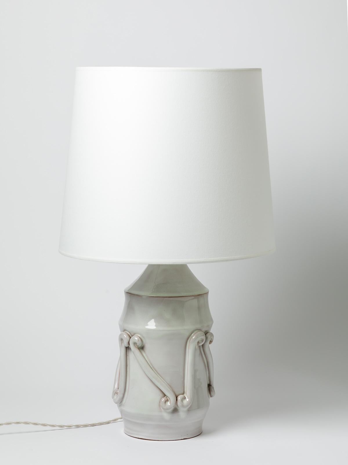 A ceramic table lamp with white glaze decoration by Jean Austry.
Sold with a new lamp shaded new european electrical system
Perfect original conditions.
Signed under the base.
Circa 1960- 1970.
Dimensions :
- Ceramic only : 30 x 16 cm / 11.8 '
