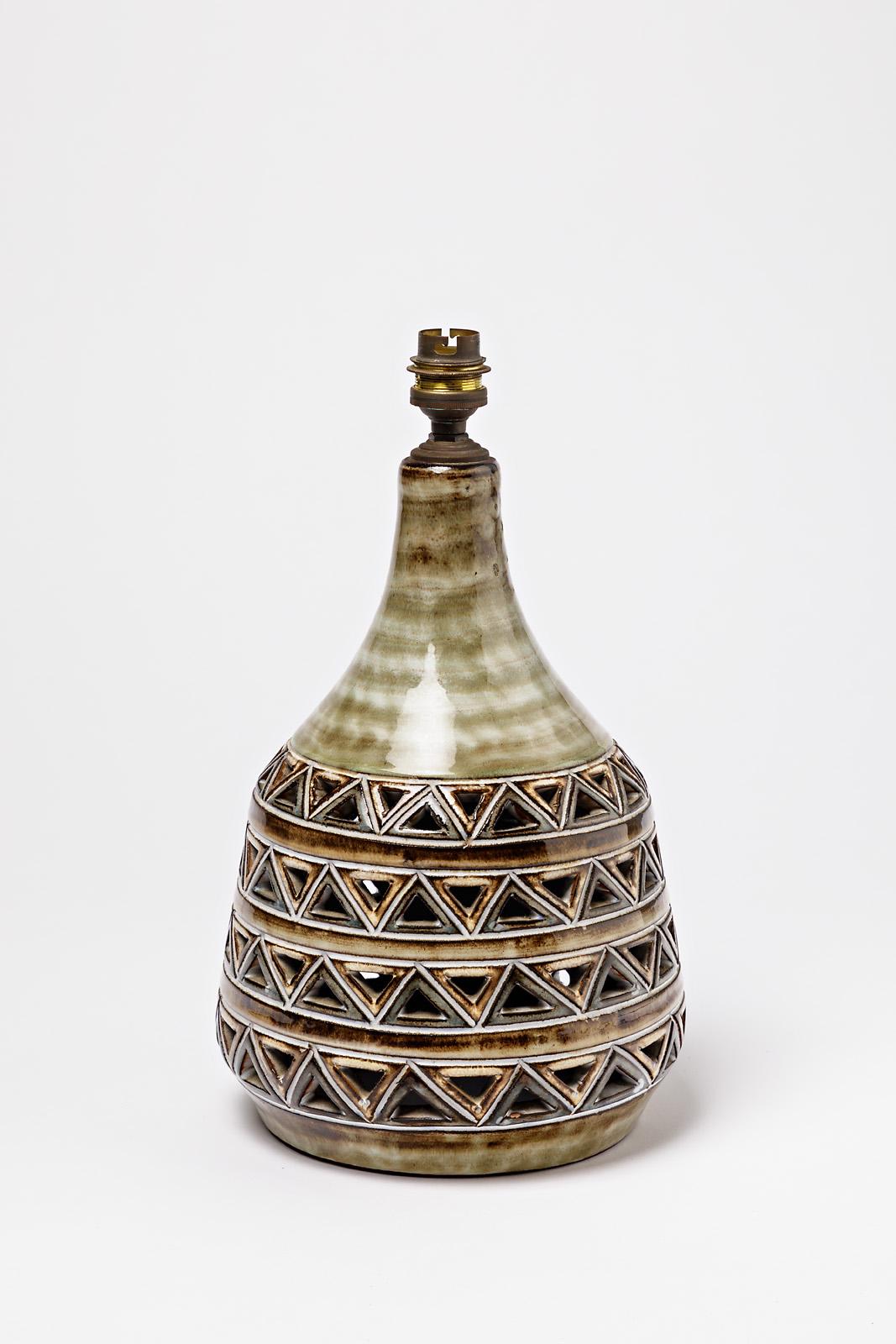 A ceramic lamp, signed 